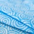 Close-up of blue and white swirl pattern on Spontex Supreme All Purpose Cloth showing texture and absorbent fibres