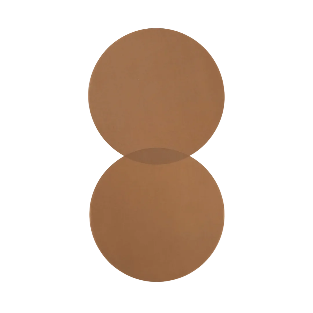 Two Bake-o-Glide PTFE round cooking and baking circles on a white background