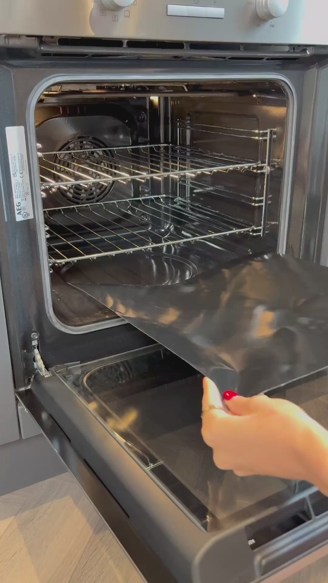 Video showing a Bake-O-Glide® Extra Thick Oven Liner being cut to size and then placed into an oven.